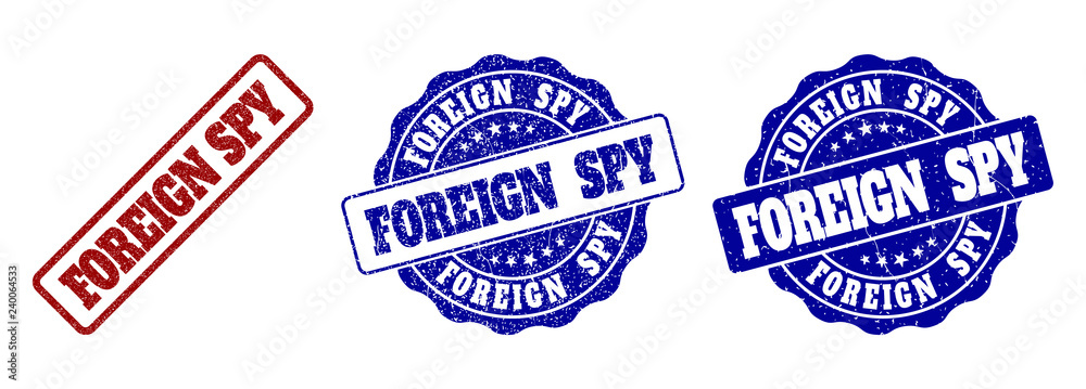 FOREIGN SPY grunge stamp seals in red and blue colors. Vector FOREIGN SPY watermarks with grunge texture. Graphic elements are rounded rectangles, rosettes, circles and text labels.