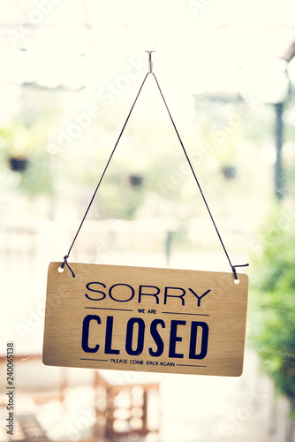 Closed sign in a shop photo