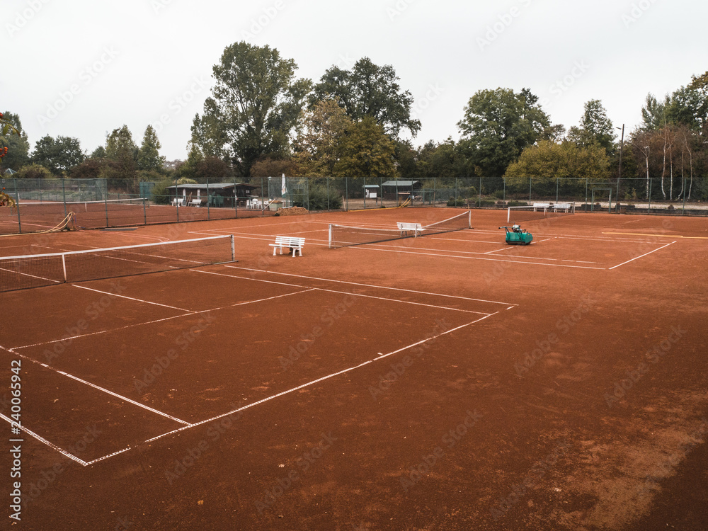 Fototapeta premium rural, abandoned tennis court in autumn.