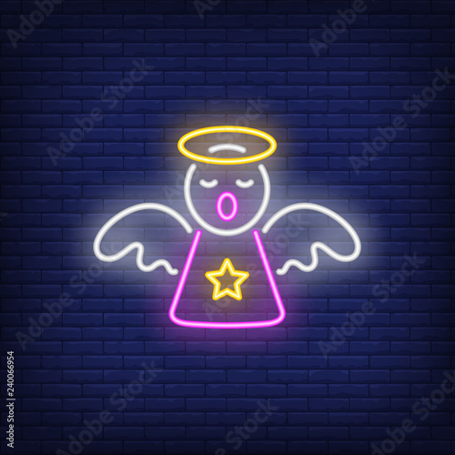 Angel with nimbus neon sign. Christmas or Easter design element. Night bright neon sign, colorful billboard, light banner. Vector illustration in neon style.