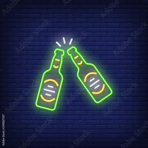 Two clinking beer bottles neon sign. Celebration design element. Night bright neon sign, colorful billboard, light banner. Vector illustration in neon style.