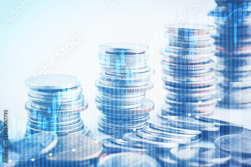 money coins arranged as a graph on white background