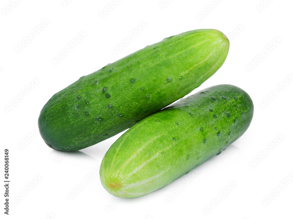 two whole cucumbers isolated on white background two whole cucumbers isolated on white background