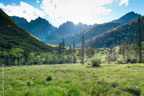 Travel the mountains Dusse Alin Russia far East Khabarovsk Krai. A beautiful valley in the mountains Dusse Alin. photo