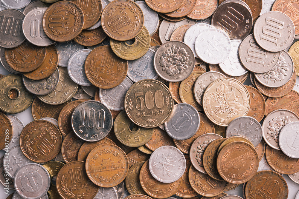 close up on 500 coins and other kind coins of Japanese Yen close up on 500 coins and other kind coins of Japanese Yen