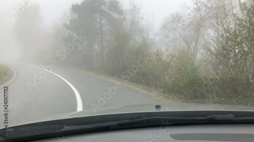 Diving the car in the foggy countryside