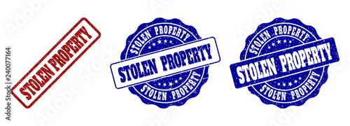 STOLEN PROPERTY scratched stamp seals in red and blue colors. Vector STOLEN PROPERTY labels with scratced surface. Graphic elements are rounded rectangles, rosettes, circles and text labels.