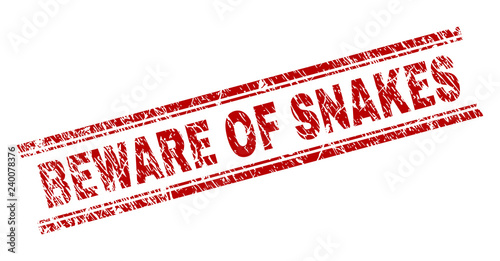 BEWARE OF SNAKES seal imprint with corroded texture. Red vector rubber print of BEWARE OF SNAKES text with scratched texture. Text label is placed between double parallel lines.