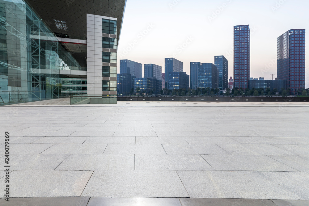 Panoramic skyline and modern business office buildings with empty road,empty concrete square floor