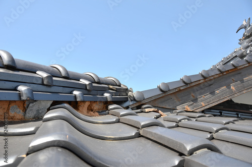 Tiled roof damaged by disaster