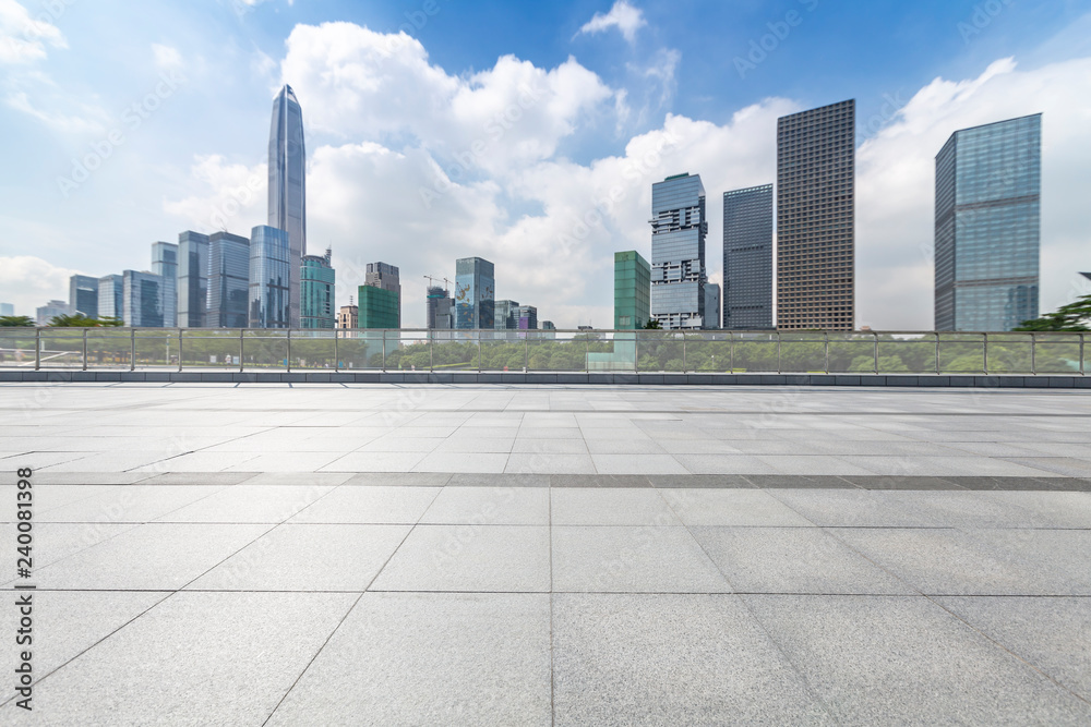 Panoramic skyline and modern business office buildings with empty road,empty concrete square floor