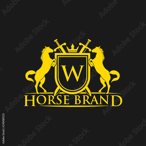 Initial Letter W logo. Horse Brand Logo design vector. Retro golden crest with shield and horses. Heraldic logo template. Luxury design concept. Can be used as logo, icon, emblem or banner.