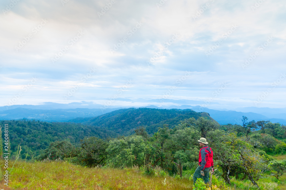 tourist standing on the top of mountain at Doi Mon Jong, Chiang Mai, Thailand