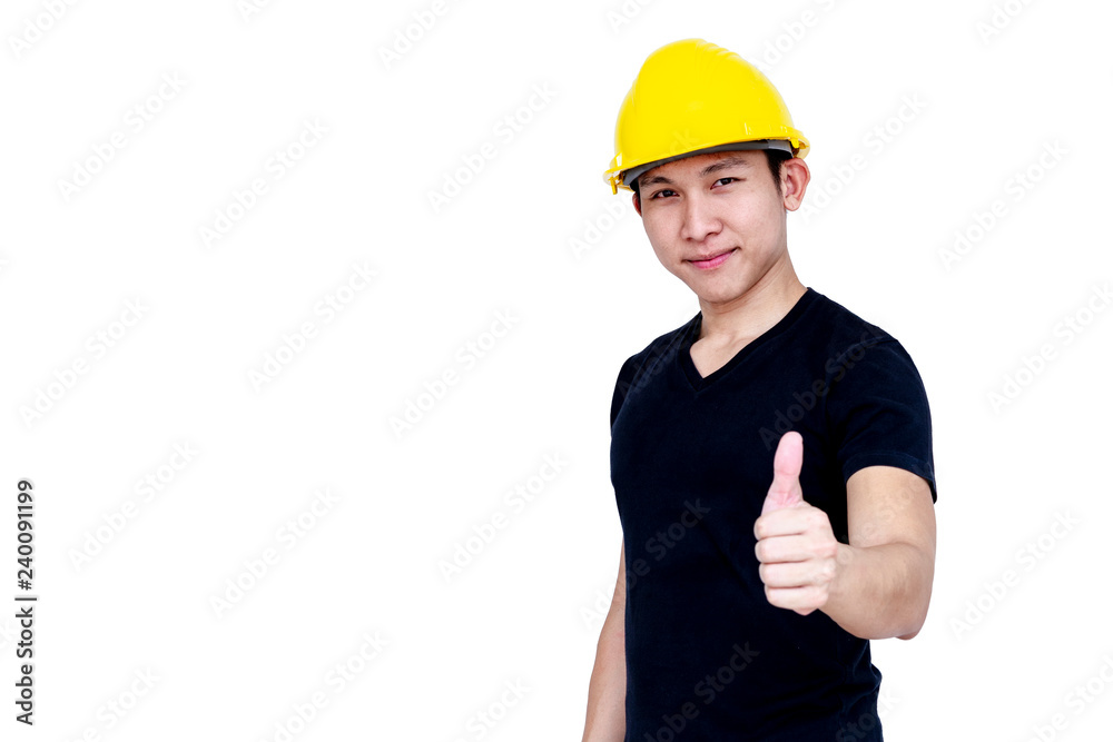 Young handsome engineer wear yellow helmet with thumb up on isolated white background.