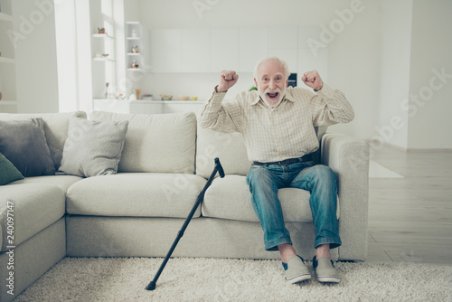 Close up photo of grey haired he his him grandparent with walkin photo