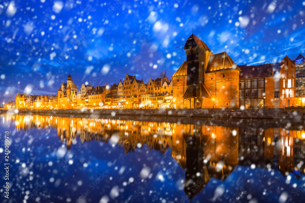 Old town of Gdansk on a cold winter night with falling snow, Poland Old town of Gdansk on a cold winter night with falling snow, Poland
