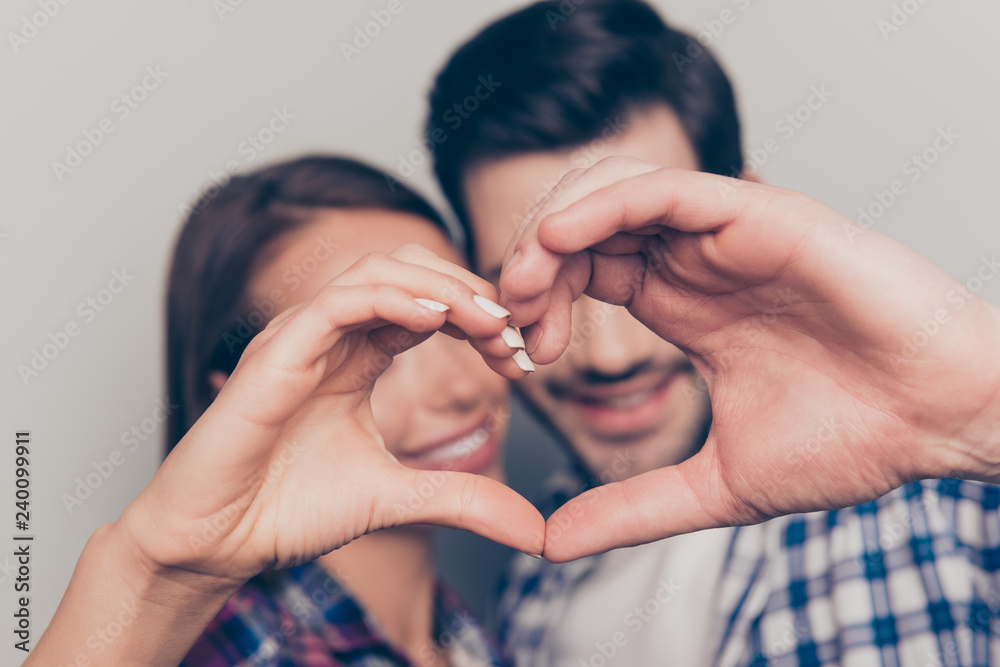 Close-up showing heart gesture of nice lovable attractive cheerf Close-up showing heart gesture of nice lovable attractive cheerf