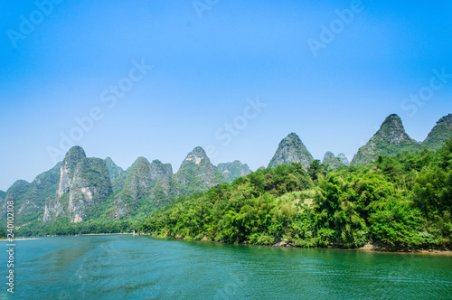 Mountains and river scenery with blue sky