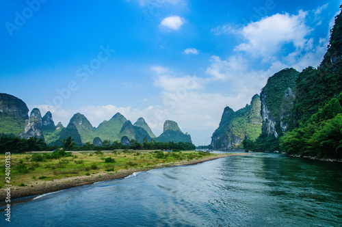 Mountains and river scenery with blue sky 