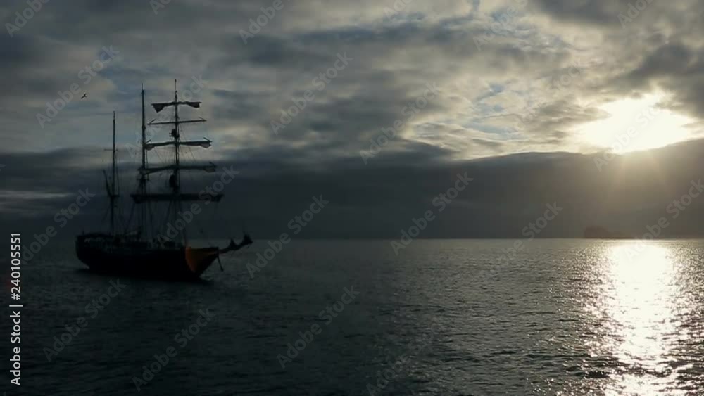 Lonely sailing ship in the ocean Lonely sailing ship in the ocean