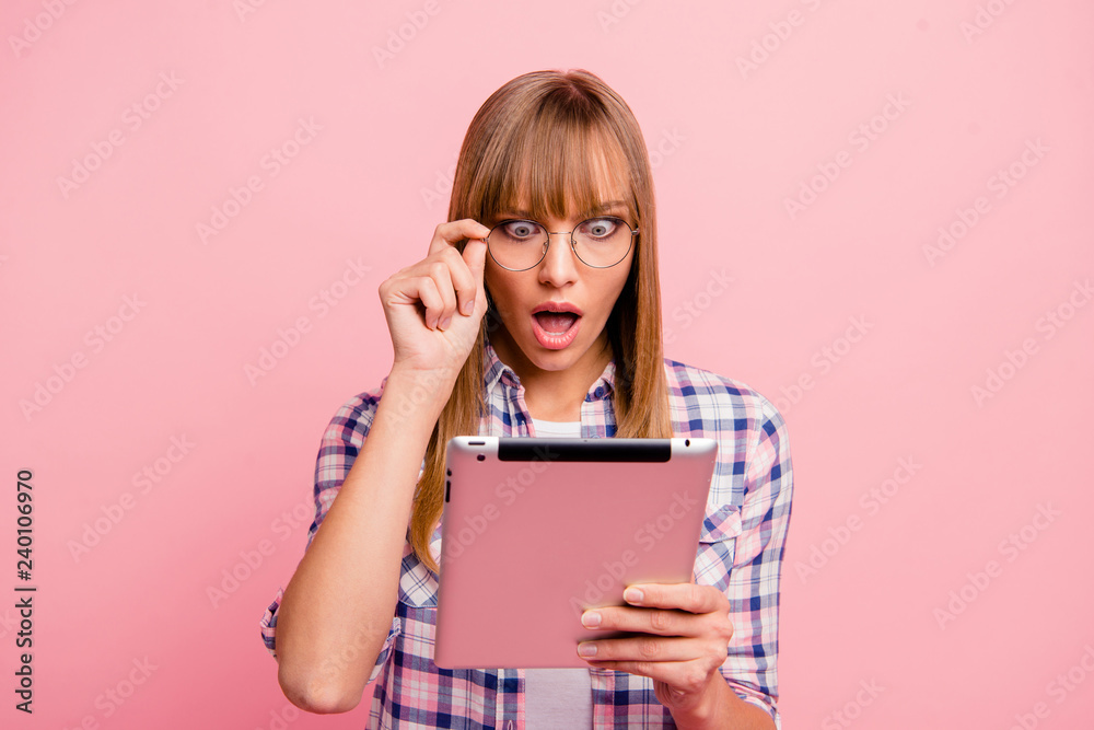 Portrait of nice attractive amazed straight-haired girl in check Portrait of nice attractive amazed straight-haired girl in check