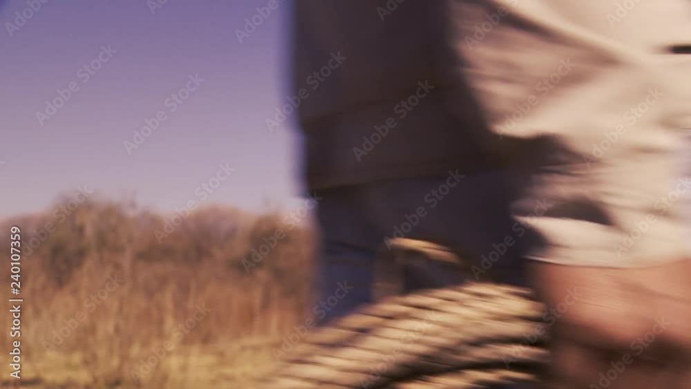 Argentine Ranch Scene: Rancher Holding a Rope to Capture Cattle - Close Up Argentine Ranch Scene: Rancher Holding a Rope to Capture Cattle - Close Up