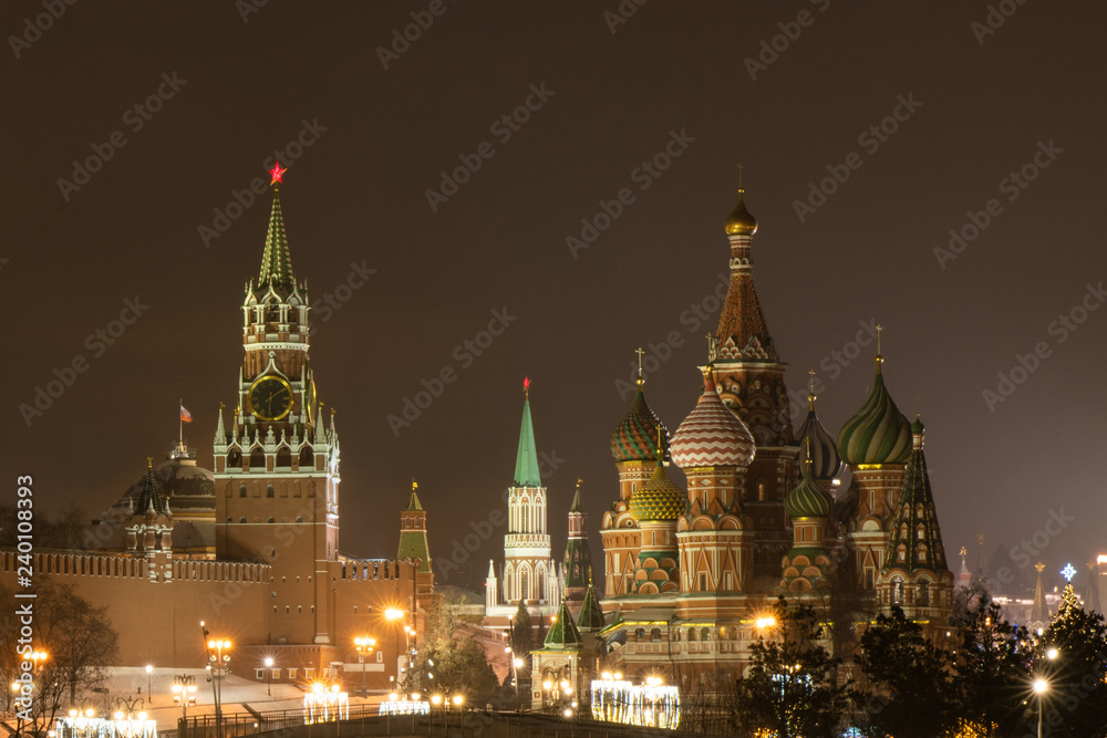 Kremlin tower and St. Basil's Cathedral in the center of Moscow at night