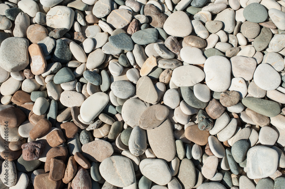 Beach round boulder stone background