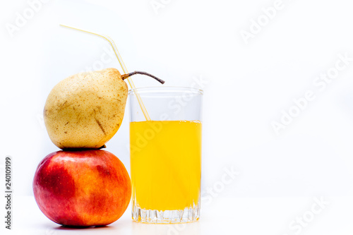 different fruit and juice or smoothie in a glass