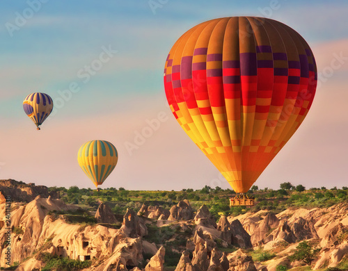 Hot air balloons in the air, popular tourist attraction in Cappadocia, Turkey