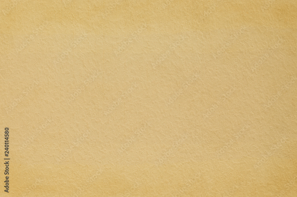 Pastel yellow gold textured background. Sheet from an old book. Toned Pastel yellow gold textured background. Sheet from an old book. Toned