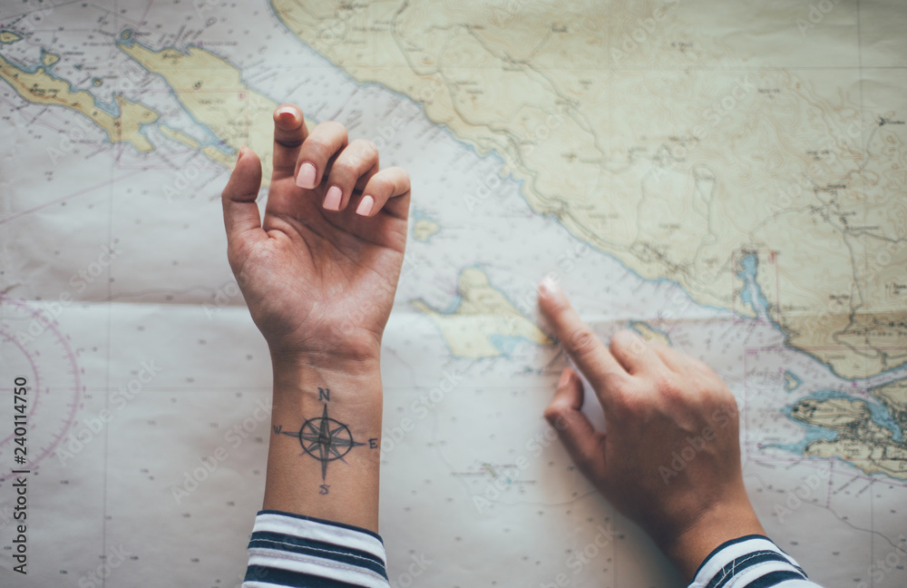 Searching for direction. Compass tattoo on the ankle. Stock Photo | Adobe  Stock