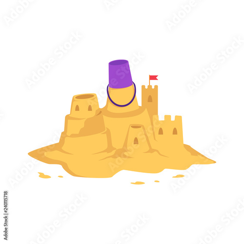 Sandcastle with kid toy bucket and little red flag in flat style isolated on white background - vector illustration of castle with tower made from yellow sand for summer seashore recreation concept.