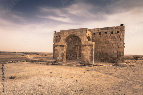 Jordan - September 30, 2018: Ruins of an ancient castle in the dunes of the desert of Jordan