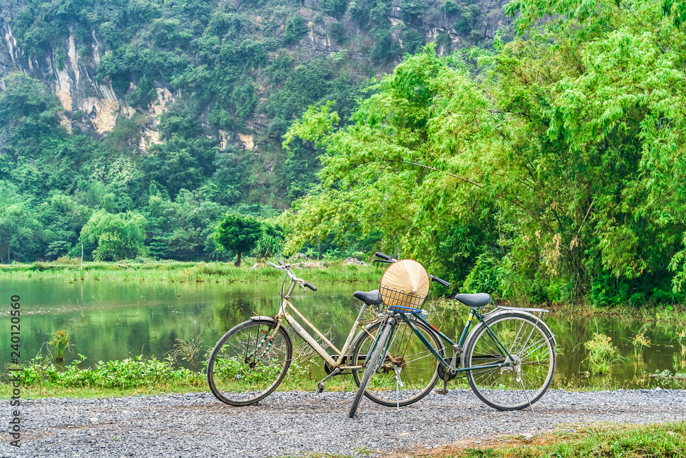 Two bicycles on the mountains in Ninh Binh, Vietnam