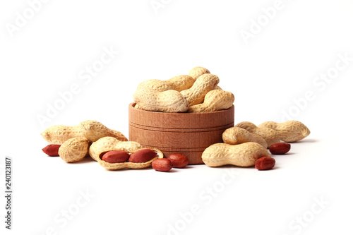  raw peanuts in shell on white background