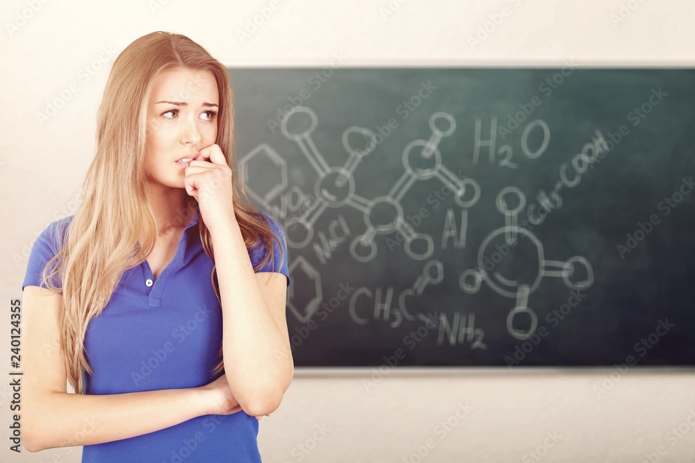 Worried Young Woman Biting Nails - Isolated Worried Young Woman Biting Nails - Isolated