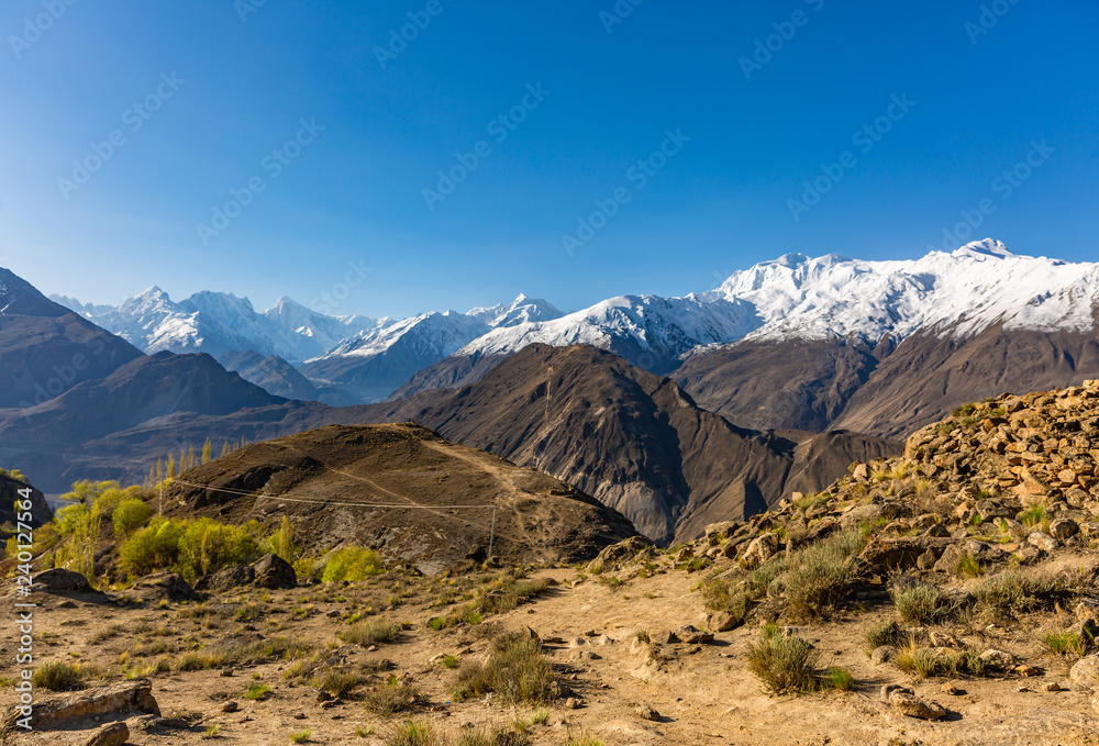 Scenic view of Hunza Valley in autumn between the Karakoram Mountain range in Pakistan