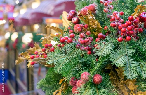 Christmas decoration of red berries and green fir-tree.