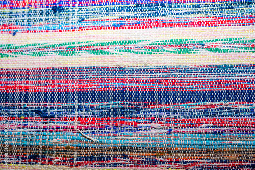 Colorful Transsylvanian home made carpet close up shot, image for background.