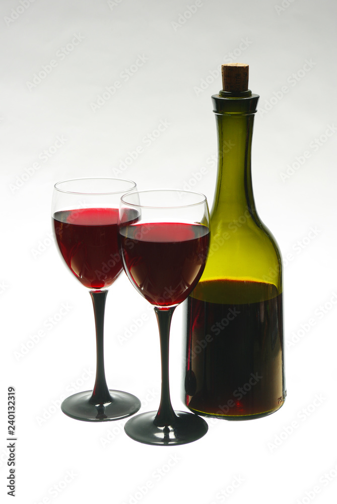 Glasses with red wine and bottle Glasses with red wine and bottle