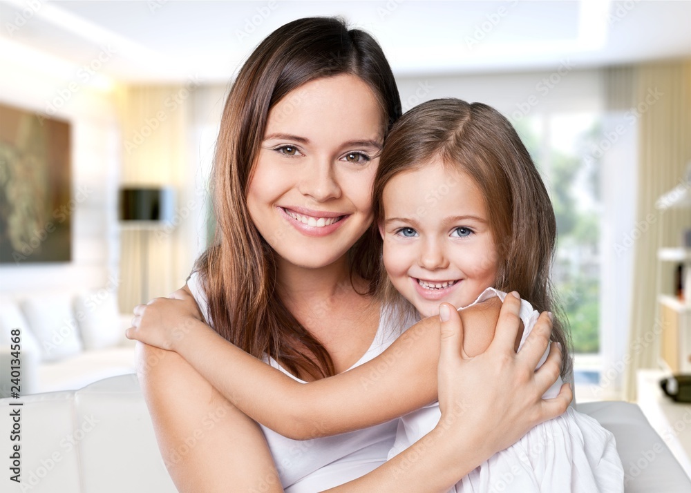 Happy Mother and daughter hugging Happy Mother and daughter hugging