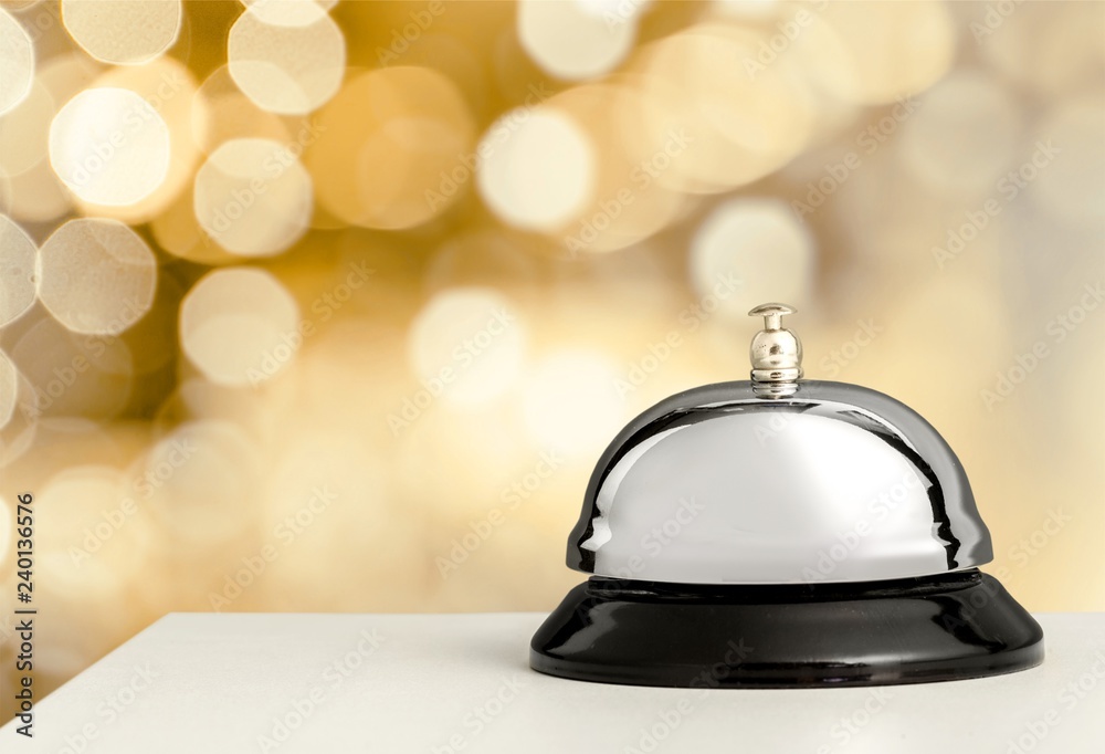 Obraz premium Hotel ring on wooden table background.