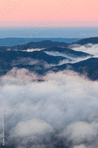 clouds and layers of mountains in the pacific northwest  washington state
