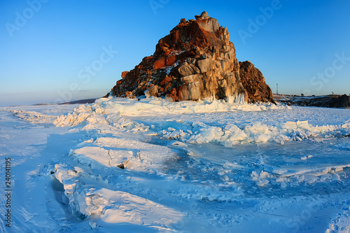 Shamanka rock in winter sunset. Olkhon island  Baikal lake  Siberia  Russia