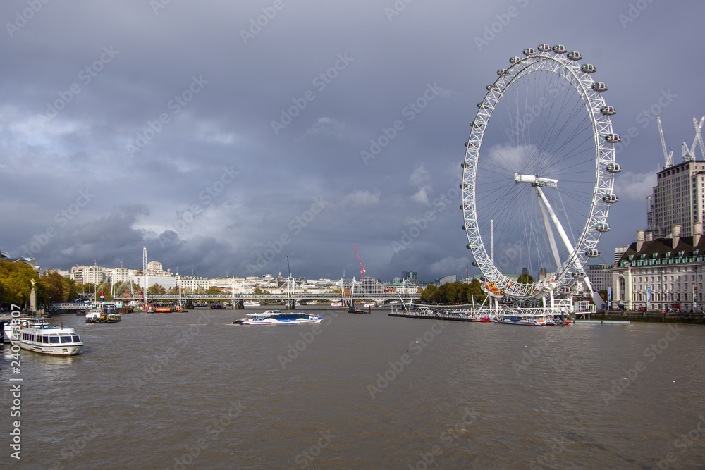 Landscape view of River Thames nad London eye. Daylight, London, autumn in England.