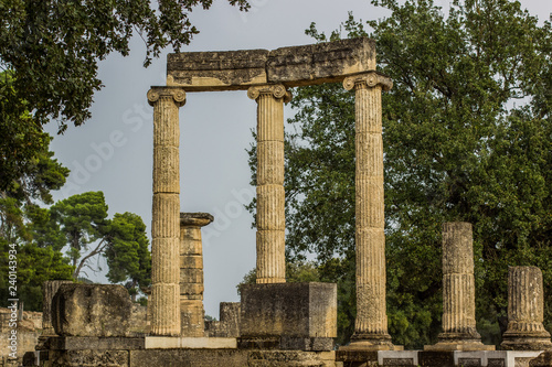 antique marble colonnade architecture concept from ancient Greek times in south European district Peloponnese are in Greece in park outdoor natural touristic and sightseeing space
