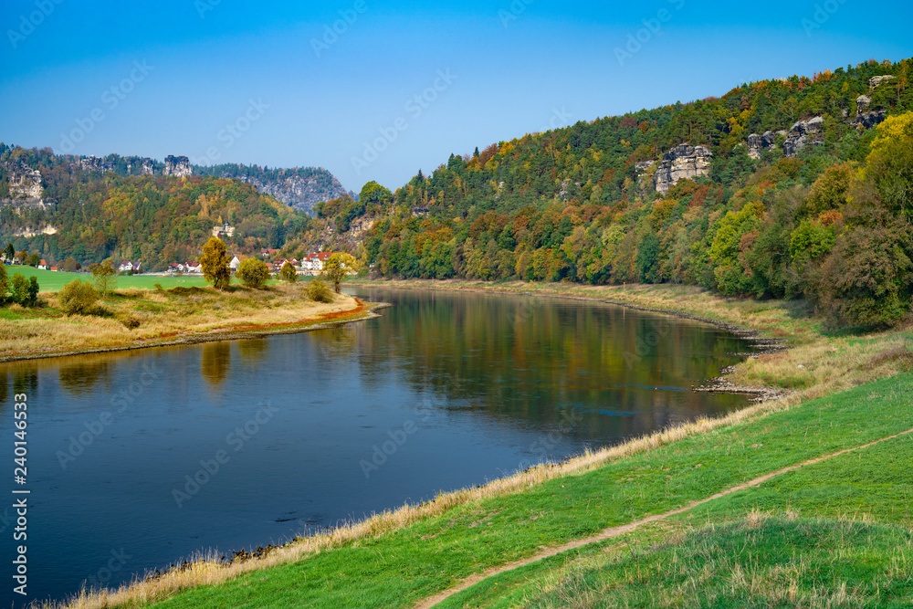 The river Elbe in the Saxon Switzerland National Park, Germany, (German: Nationalpark Sächsische Schweiz) in late summer / early autumn.