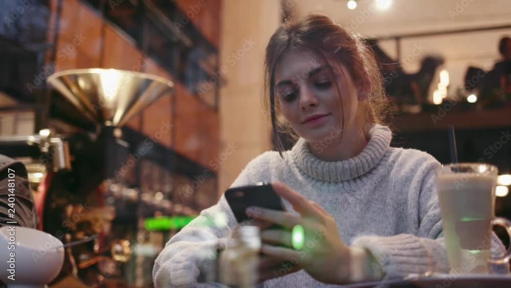 Portrait stylish young woman using smart phone technology app walk on city streets living urban happy lifestyle girl social media message attractive communication close up