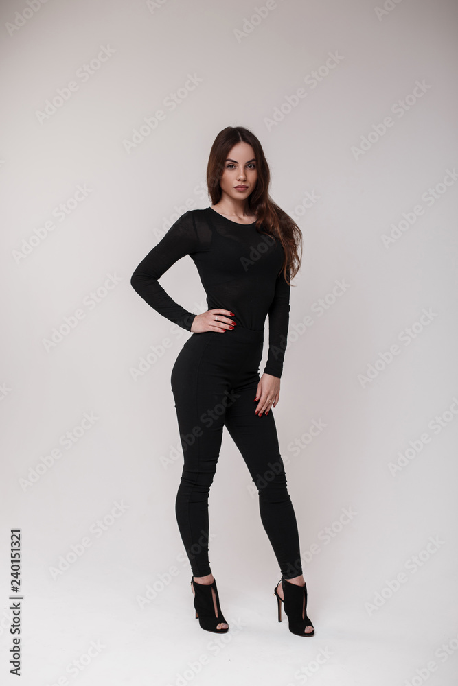 Sexy attractive beautiful brown-haired woman in a black stylish T